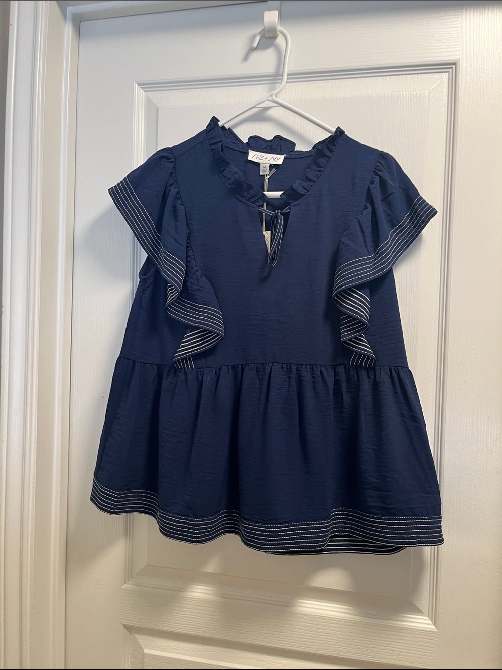 She + Sky Navy Ruffle Sleeve Peplum Blouse NEW never worn